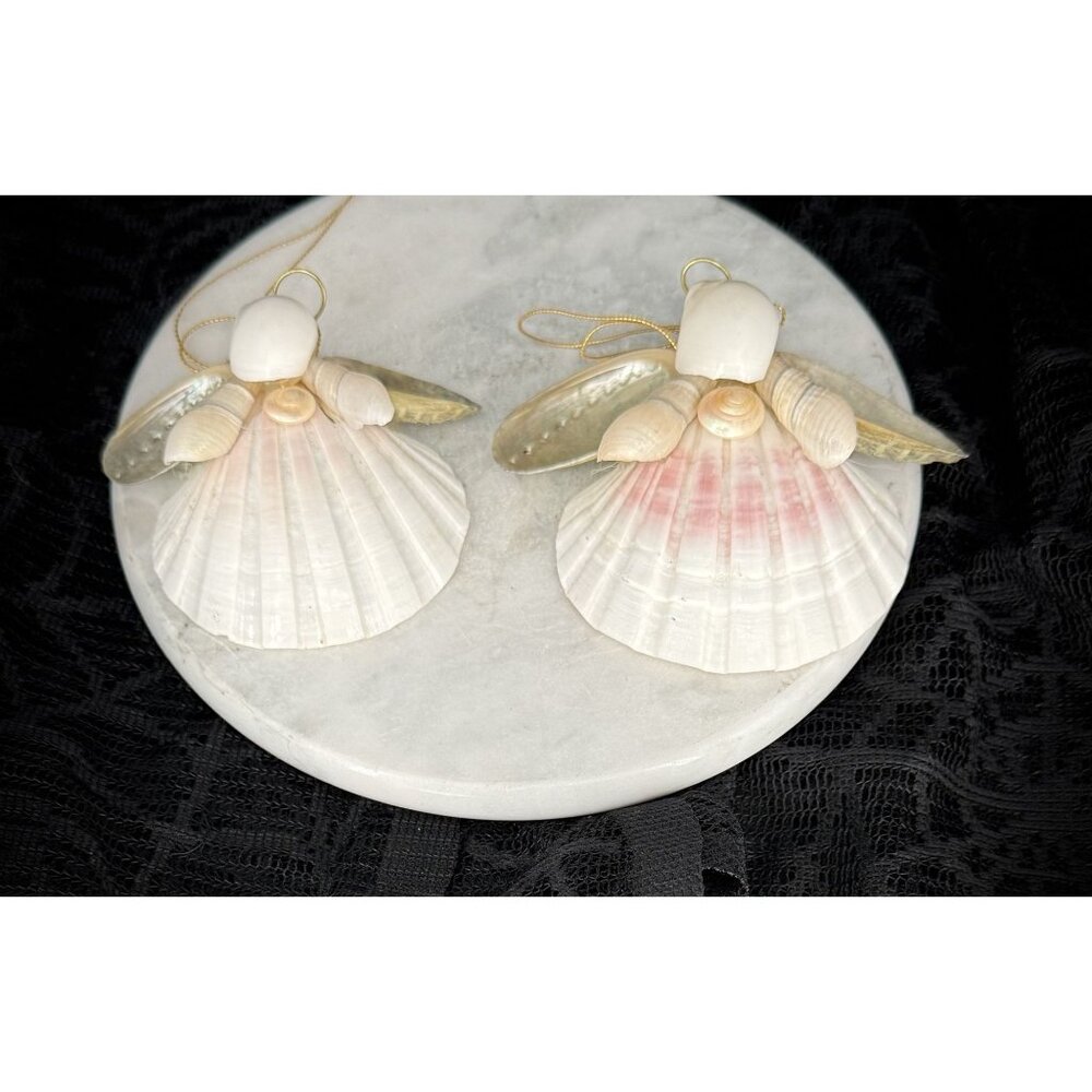handmade seashell angel ornaments.